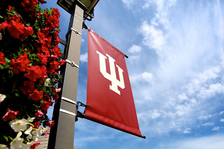 Indiana University logo on a pole banner